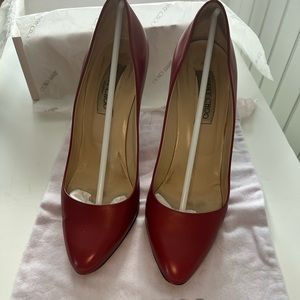 Red Jimmy Choo pumps
